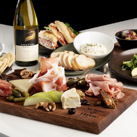 Charcuterie board with wine 